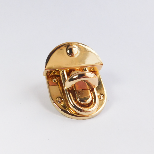 Broche puntos oro